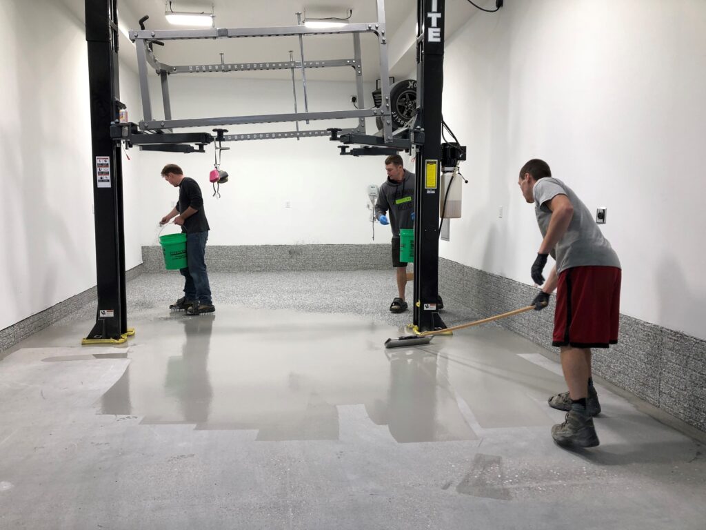 Picture of ArmorTek Floor Coatings: Omaha’s Premier Concrete Coating Experts hard at work