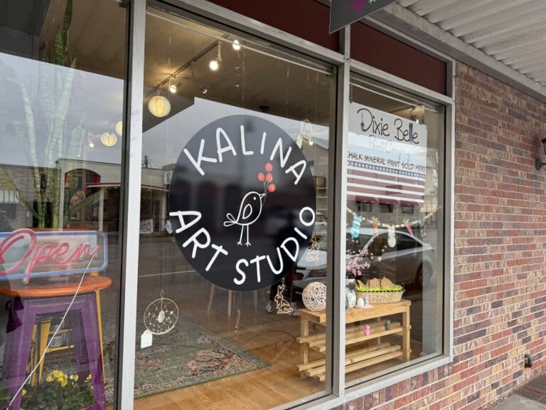 The front window of Kalina Art Studio in downtown Papillion, a welcoming space offering Papillion art classes for kids and adults.
