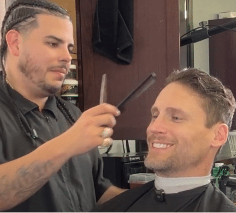 Omar giving Justin a haircut at his Bellevue barber shop, showcasing precision, care, and a welcoming community vibe.
